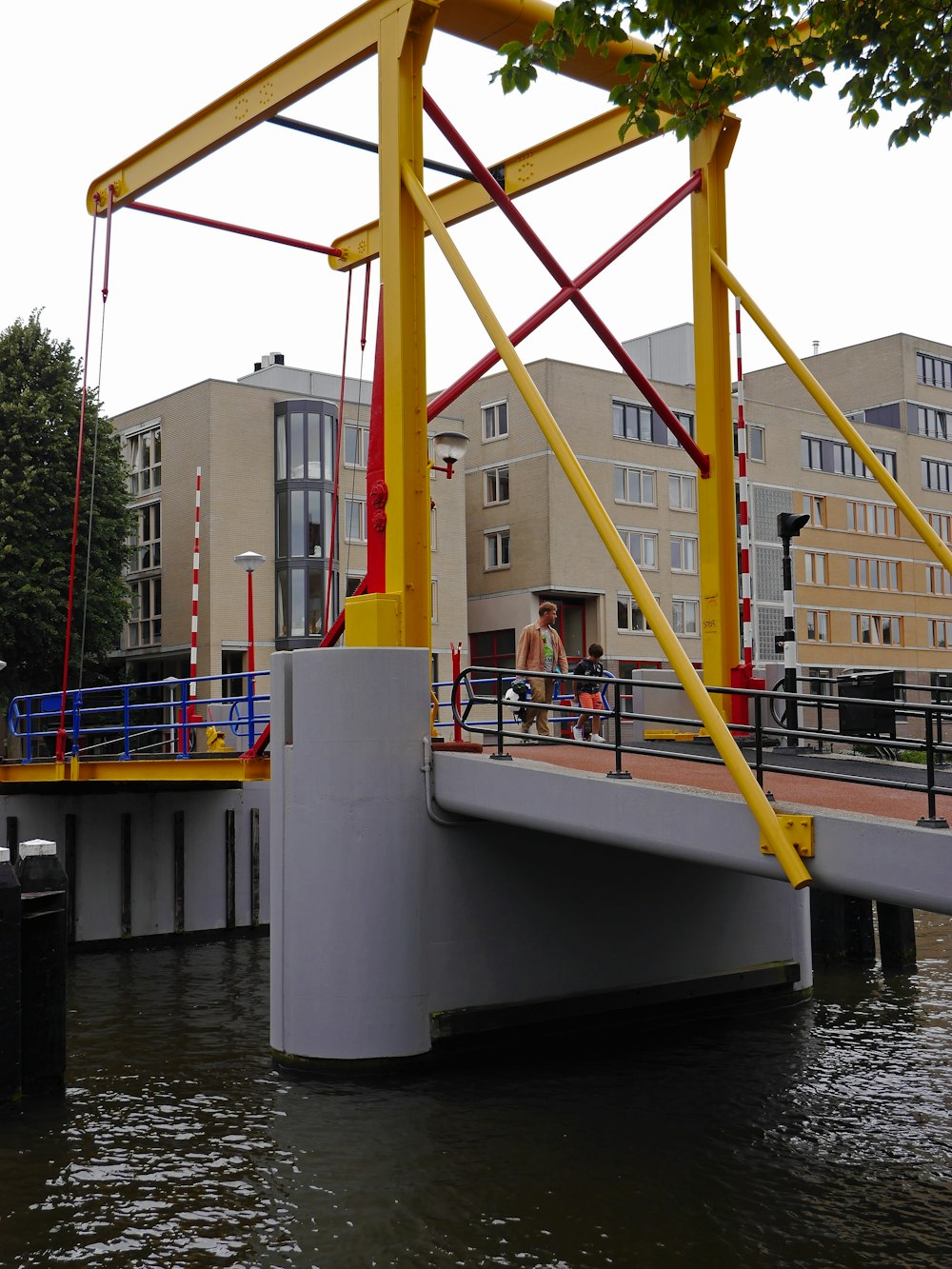 white and yellow boat on water during daytime