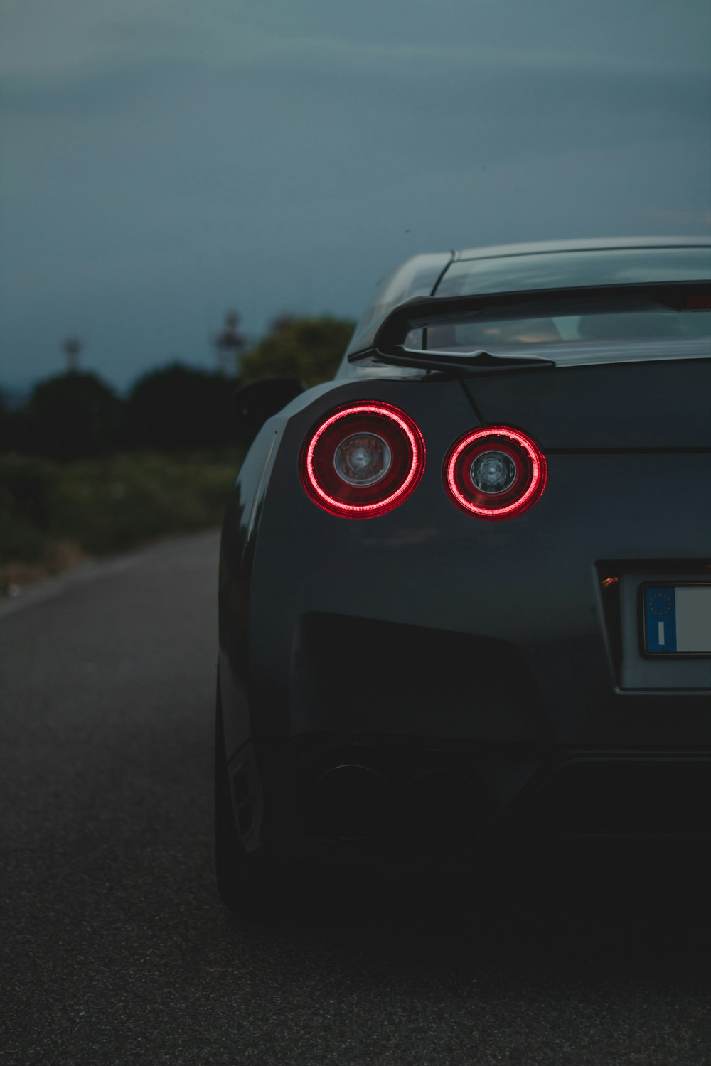 black Nissan Skyline GTR on road during daytime