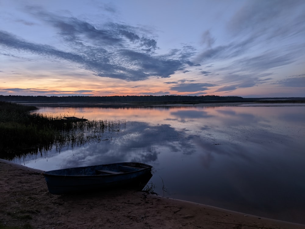 boat on water during sunset