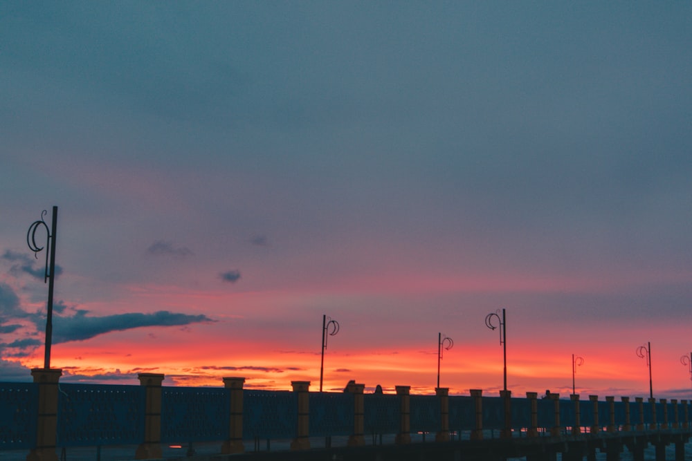 silhouette of building during sunset