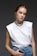 woman in white sleeveless shirt