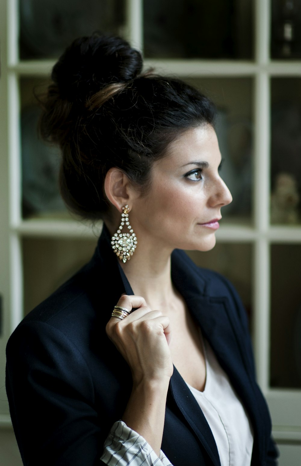 woman in black blazer and white shirt