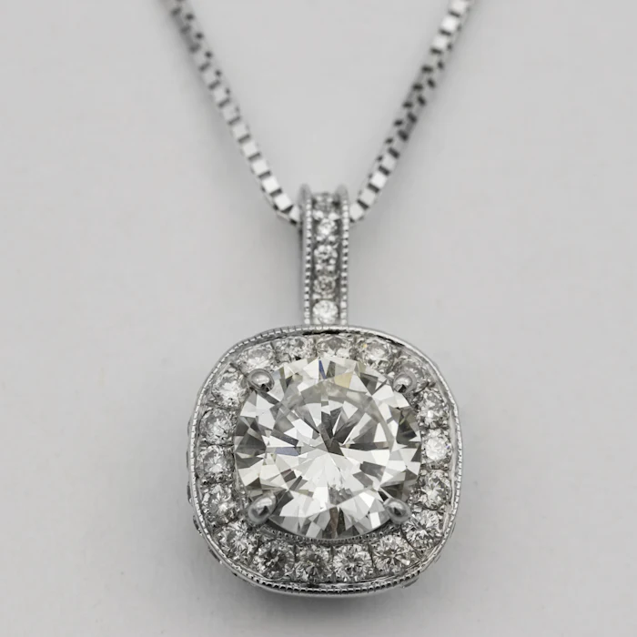 Halo diamond pendant on a silver chain