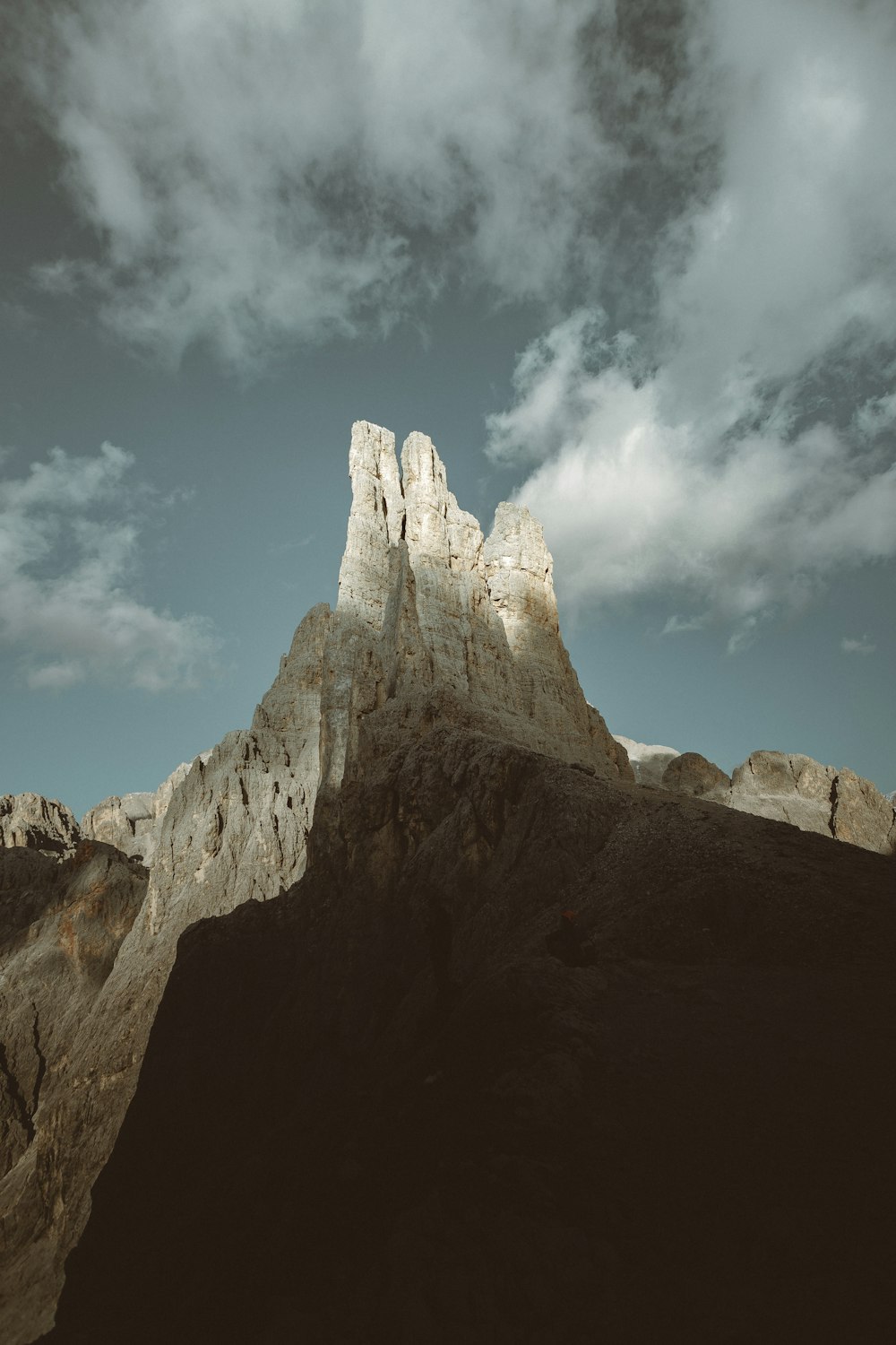 brown rocky mountain under blue sky during daytime