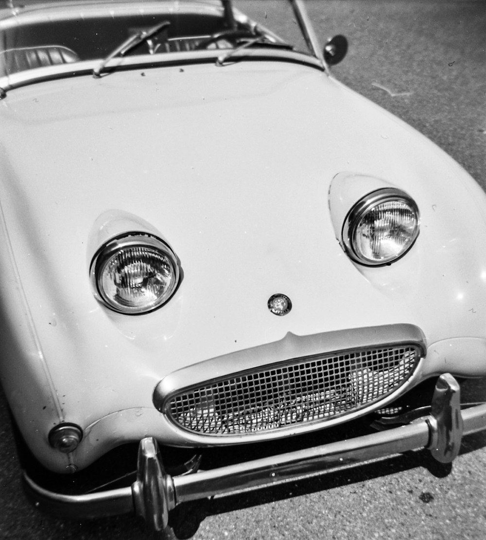 grayscale photo of classic car