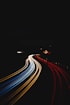 time lapse photography of cars on road during night time