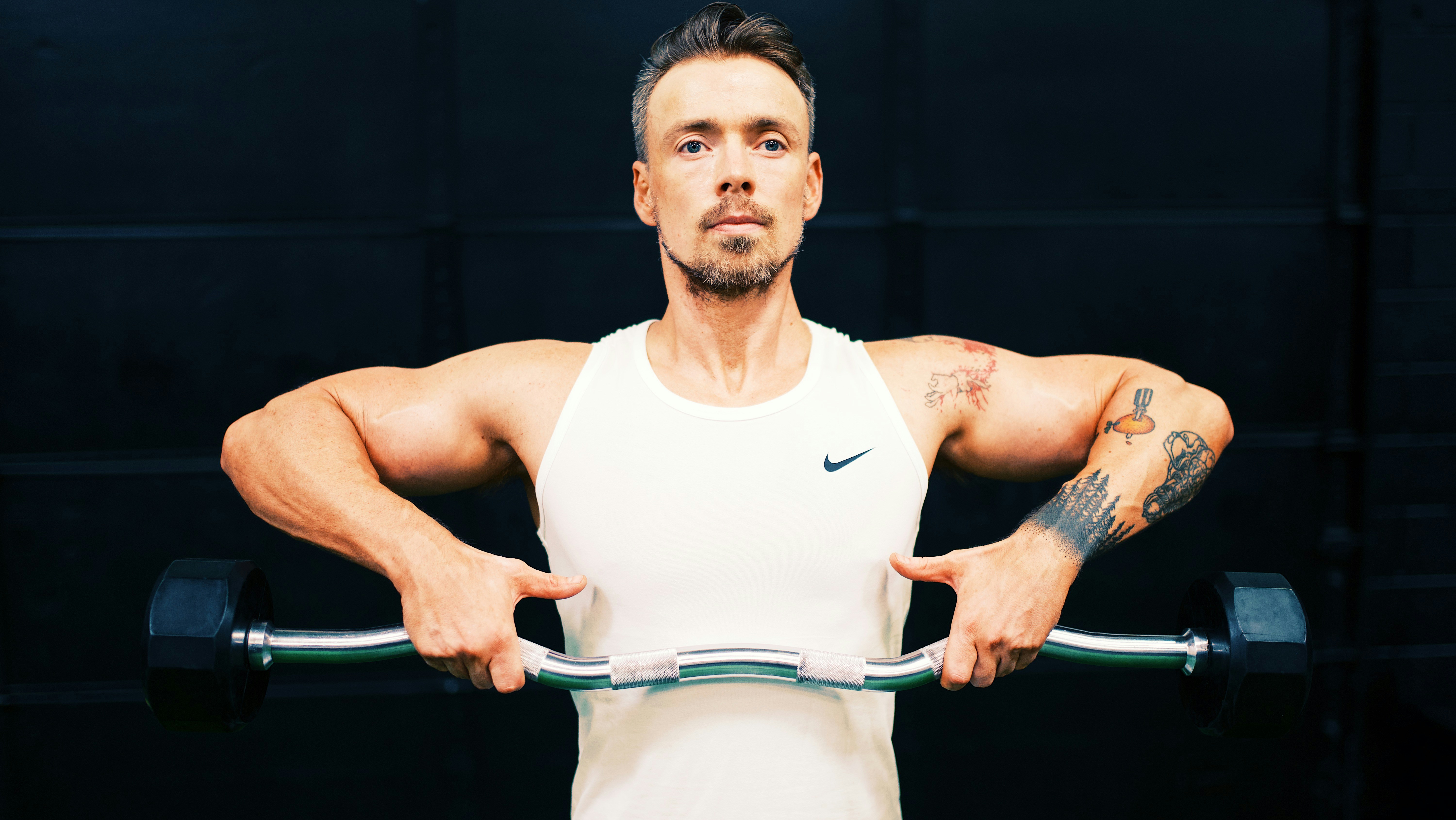 Fitness coach shoulder raise