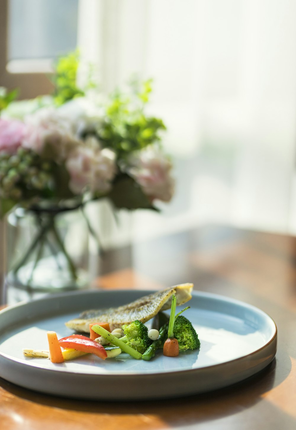 sliced vegetables on white ceramic plate