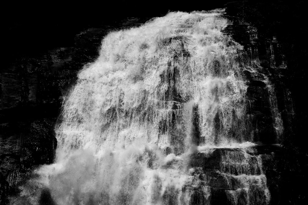 water falls in grayscale photography