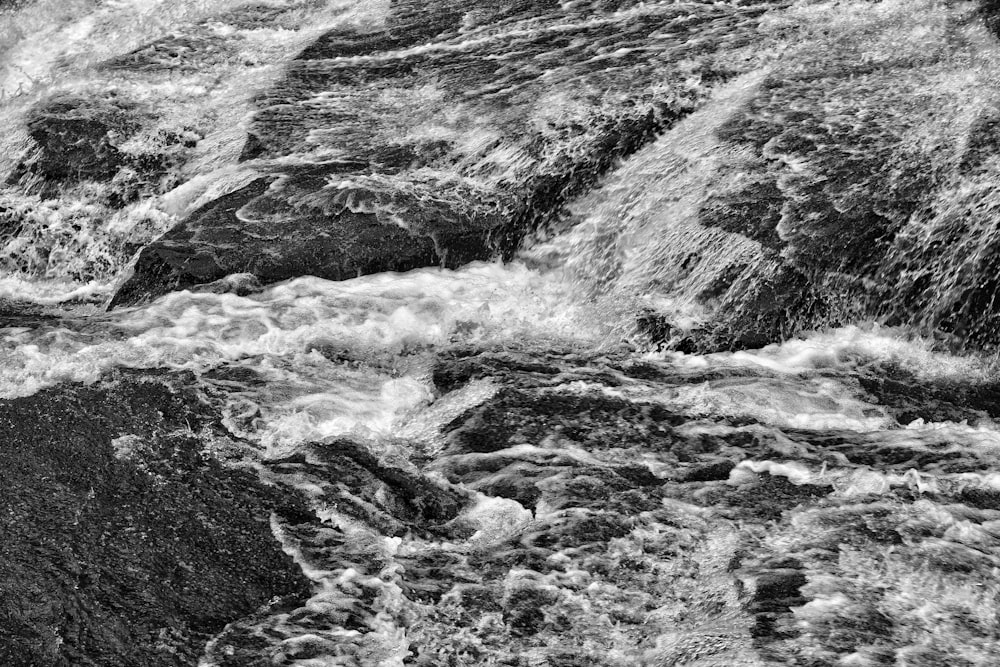 grayscale photo of water waves