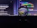 A crystal ball is placed in front of a computer screen displaying colorful code and text. The ball reflects and distorts the vivid lines of code, giving them a swirling, abstract appearance. The background is mostly dark, highlighting the bright neon colors of the text on the screen.
