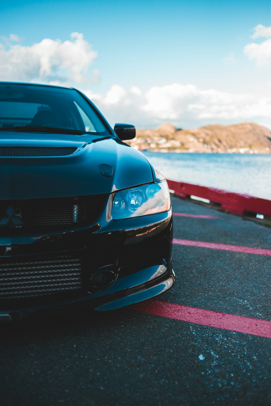 black car on road during daytime