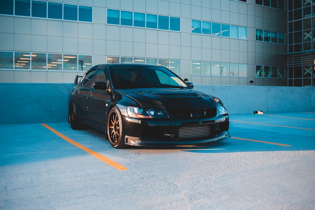 black bmw m 3 parked on parking lot