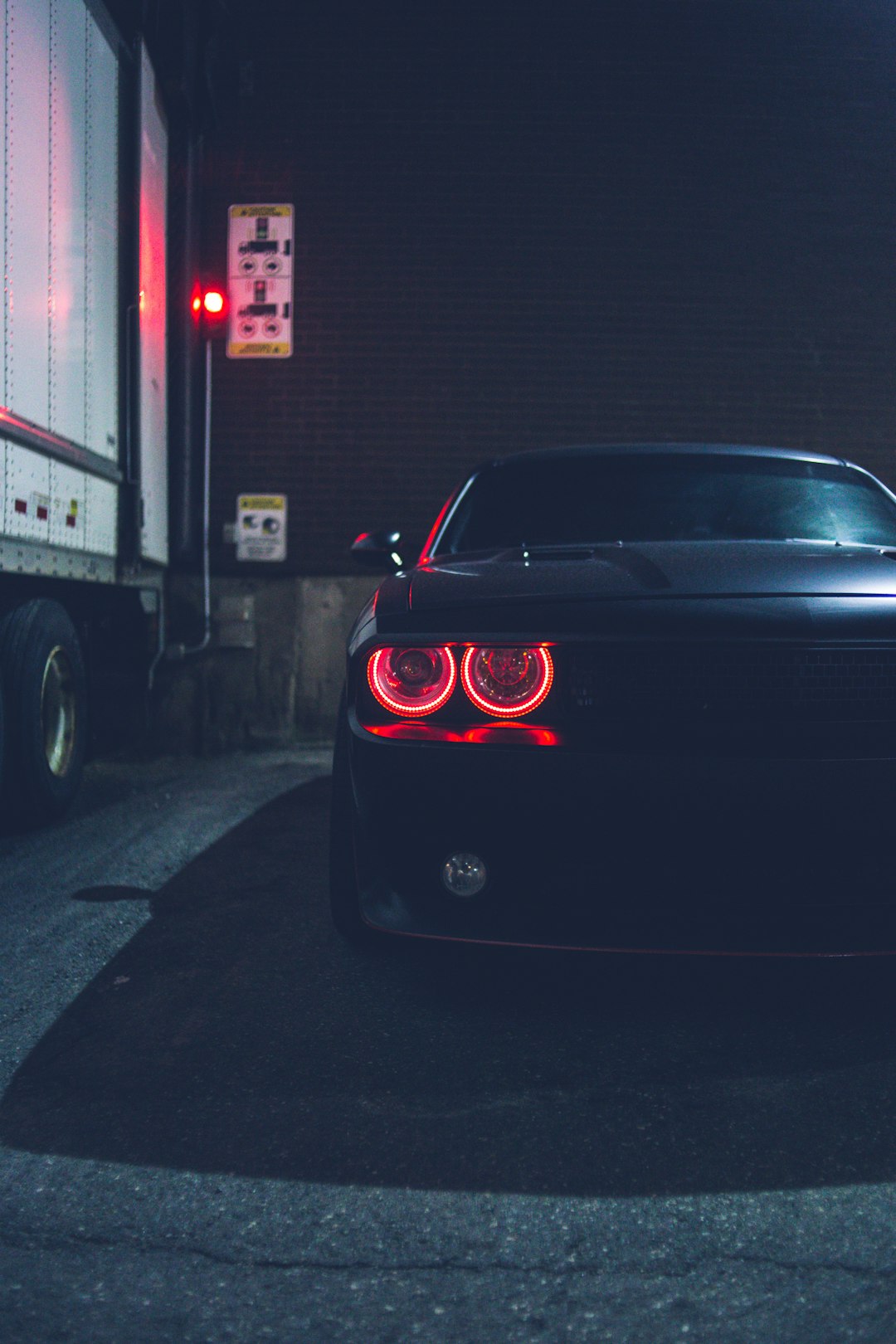 black car parked near building