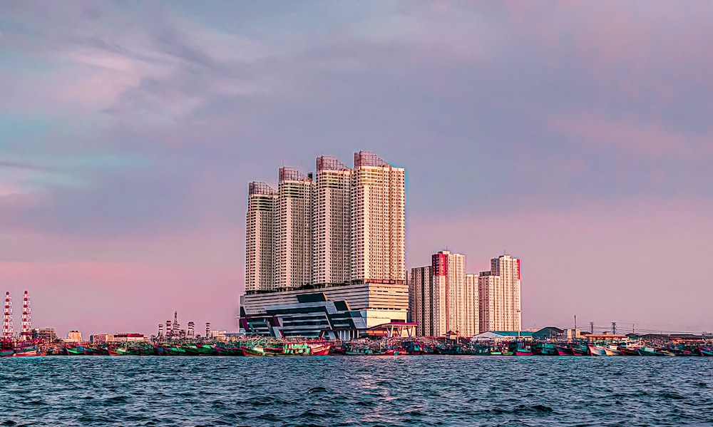 city skyline across body of water during daytime