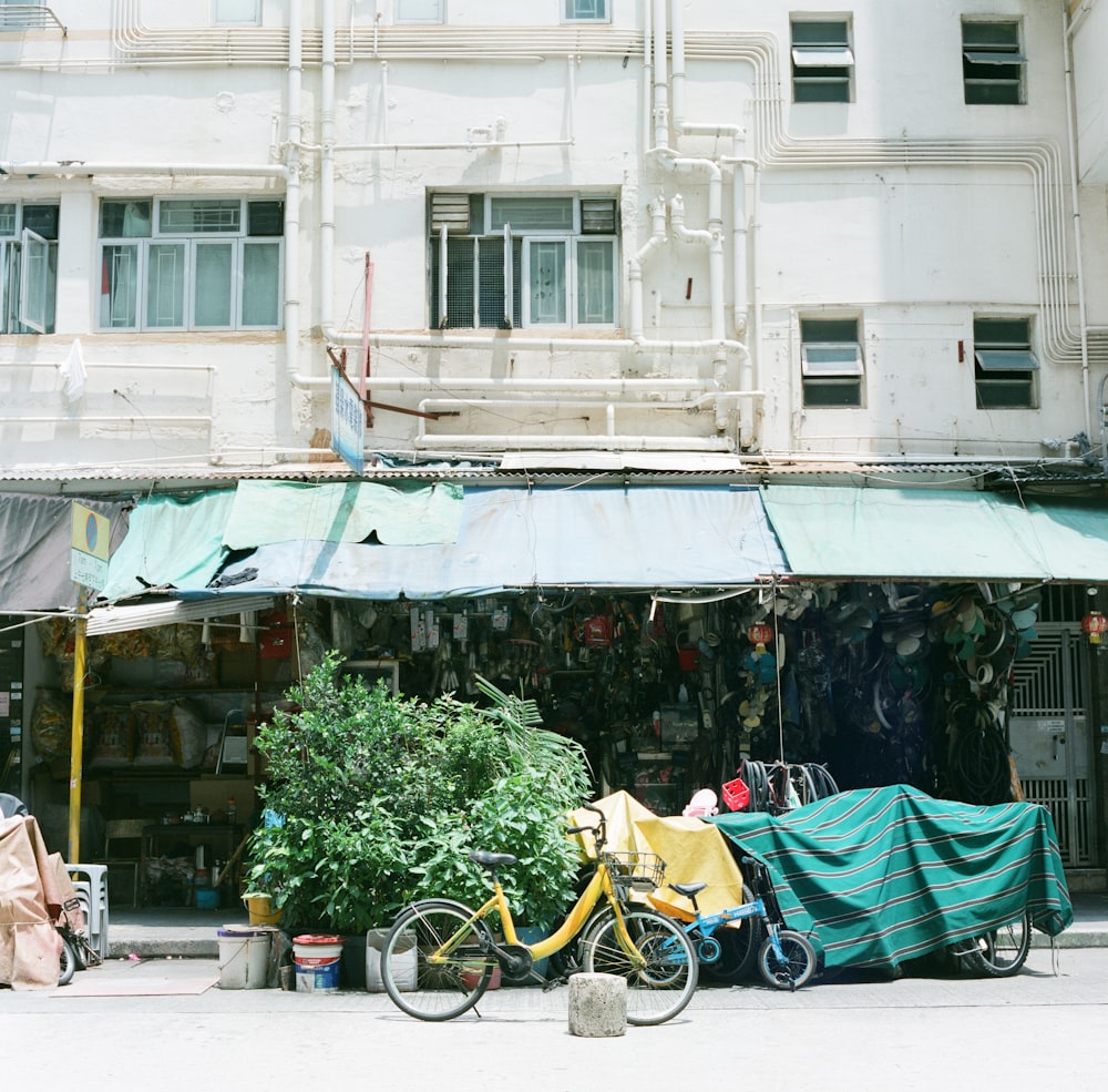 bicycle parked beside the road