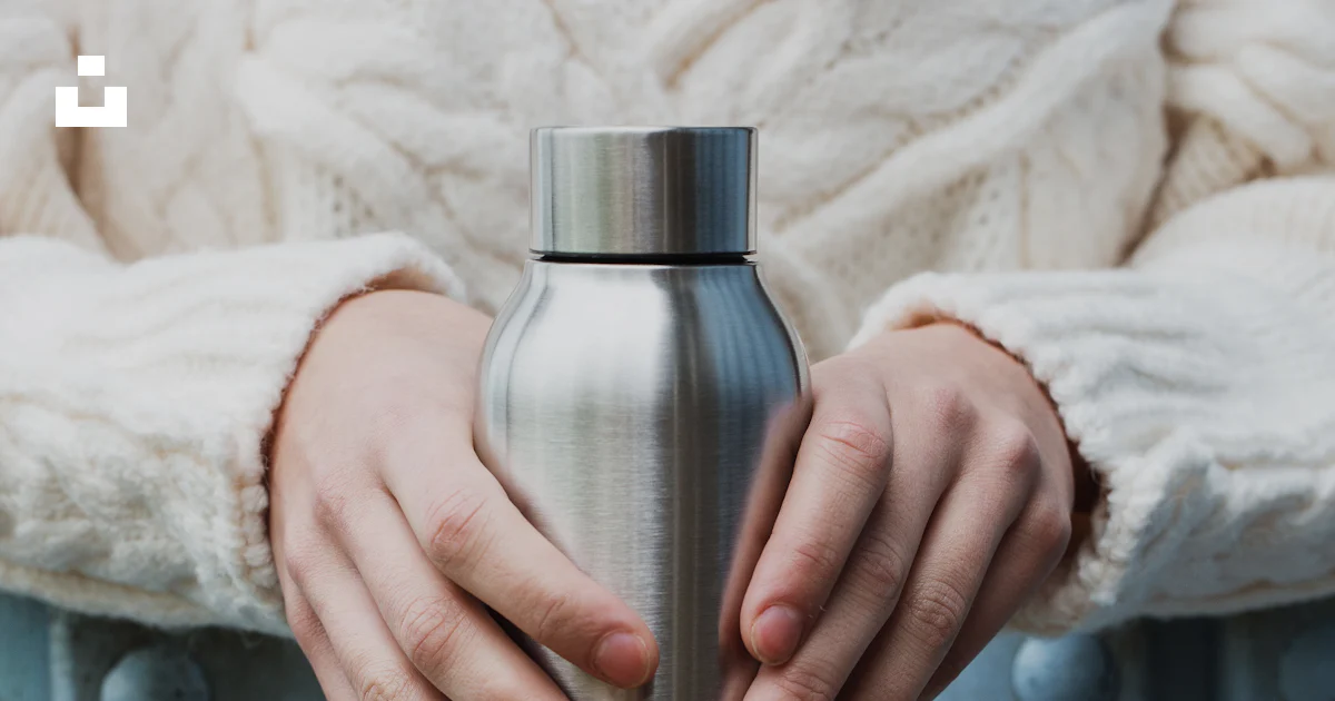 Person Using Flask Person holding stainless steel vacuum flask photo – Free Wellness Image ...
