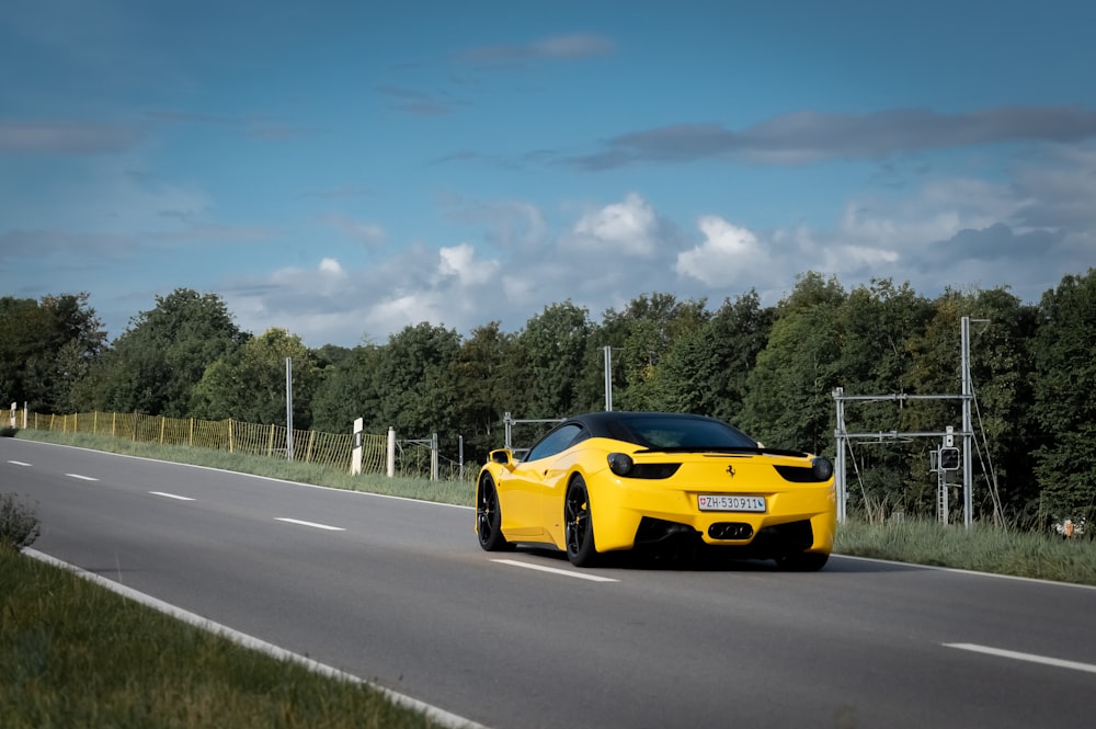 yellow ferrari 458 italia on road during daytime