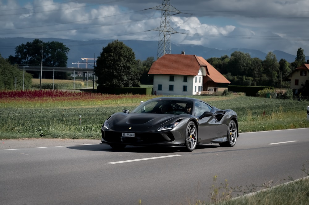 black porsche 911 on road during daytime