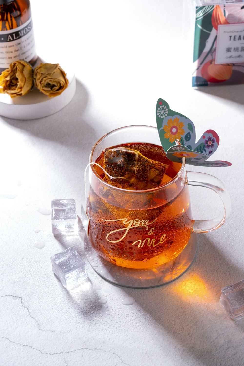 clear glass mug with tea bag