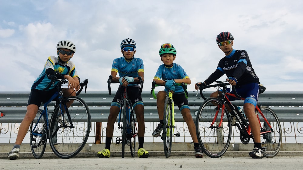 group of people riding bicycle