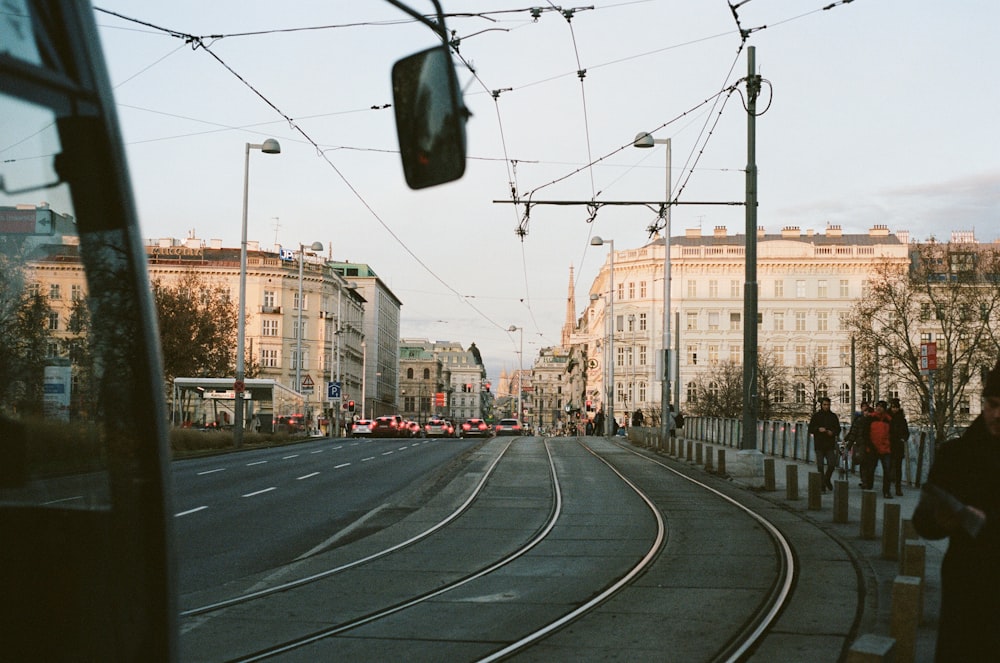 cars on road near buildings during daytime