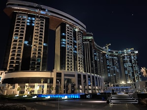 brown and white concrete building during night time