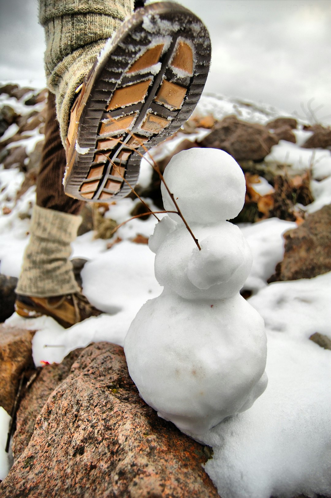 white snow on brown soil