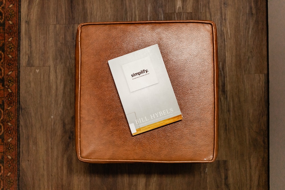 a book sitting on top of a wooden table