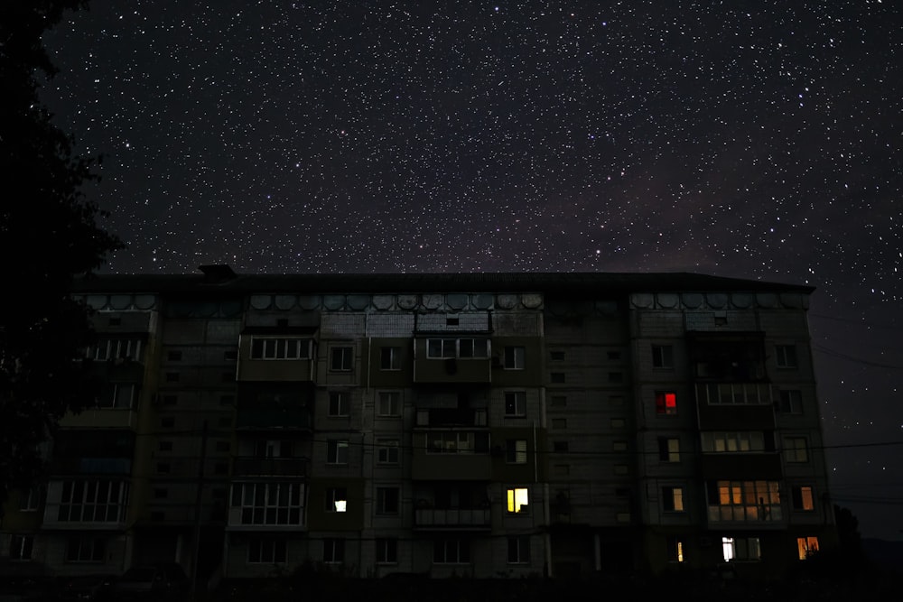 white and black concrete building under starry night