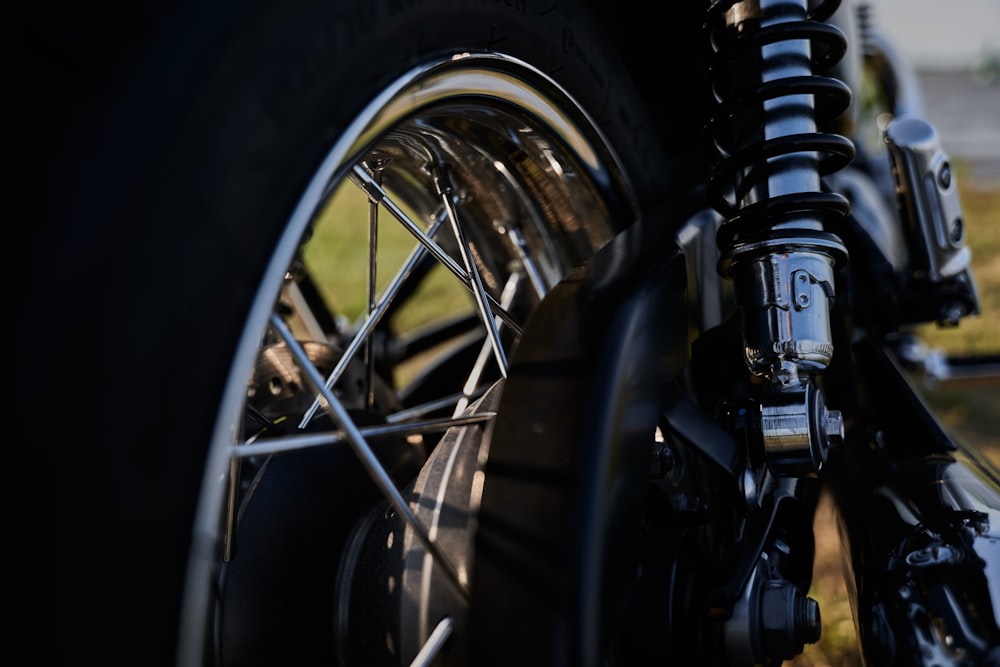 a close up of a motorcycle tire and spokes