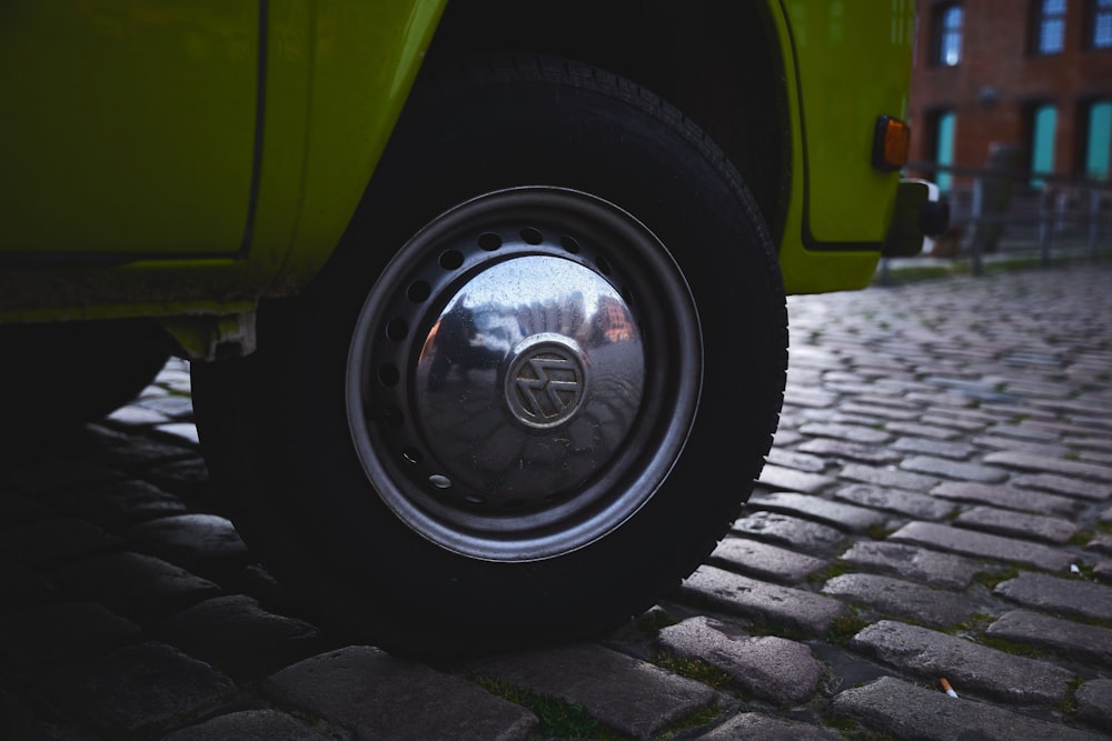 silver round coins in green car