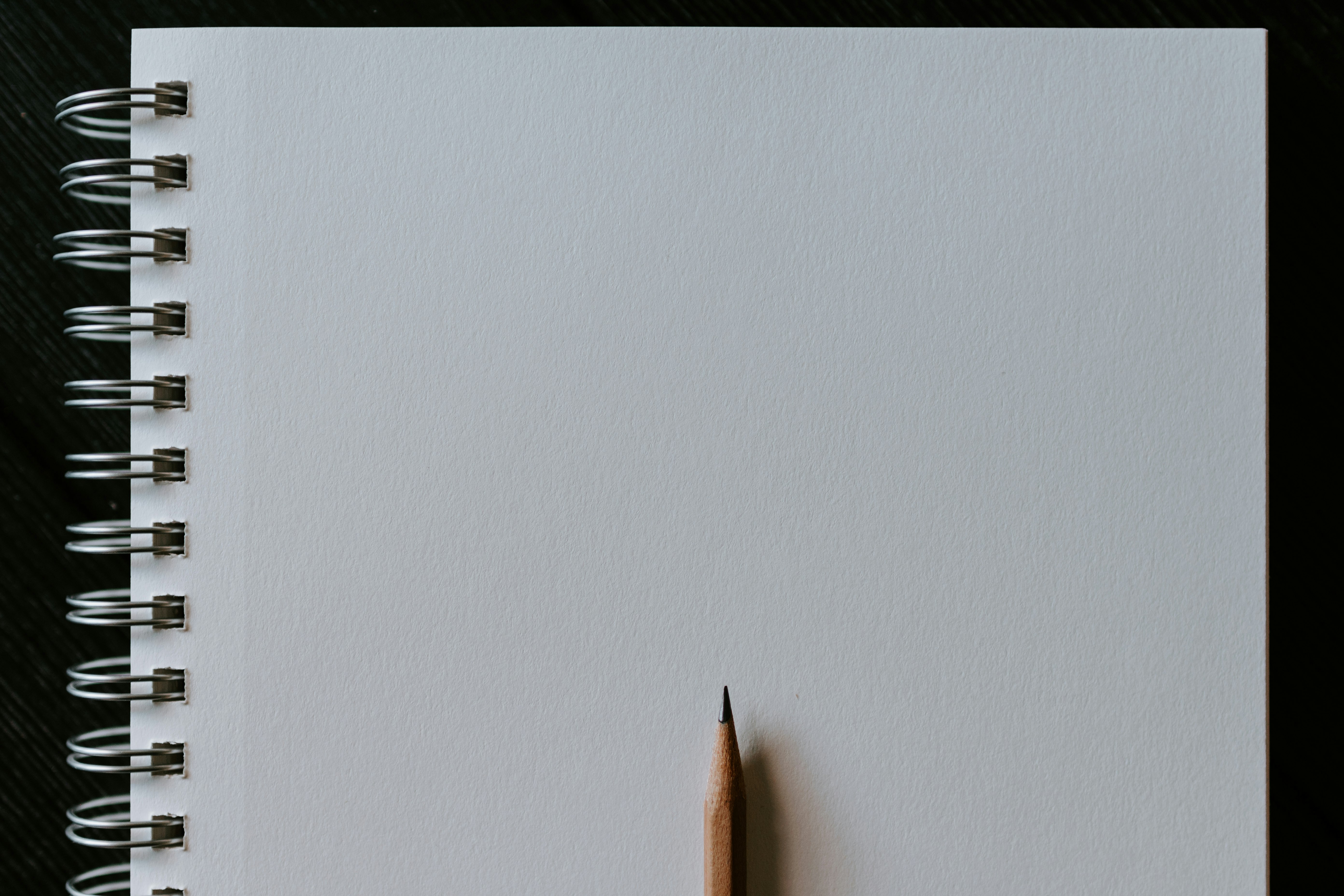 brown pencil on white surface