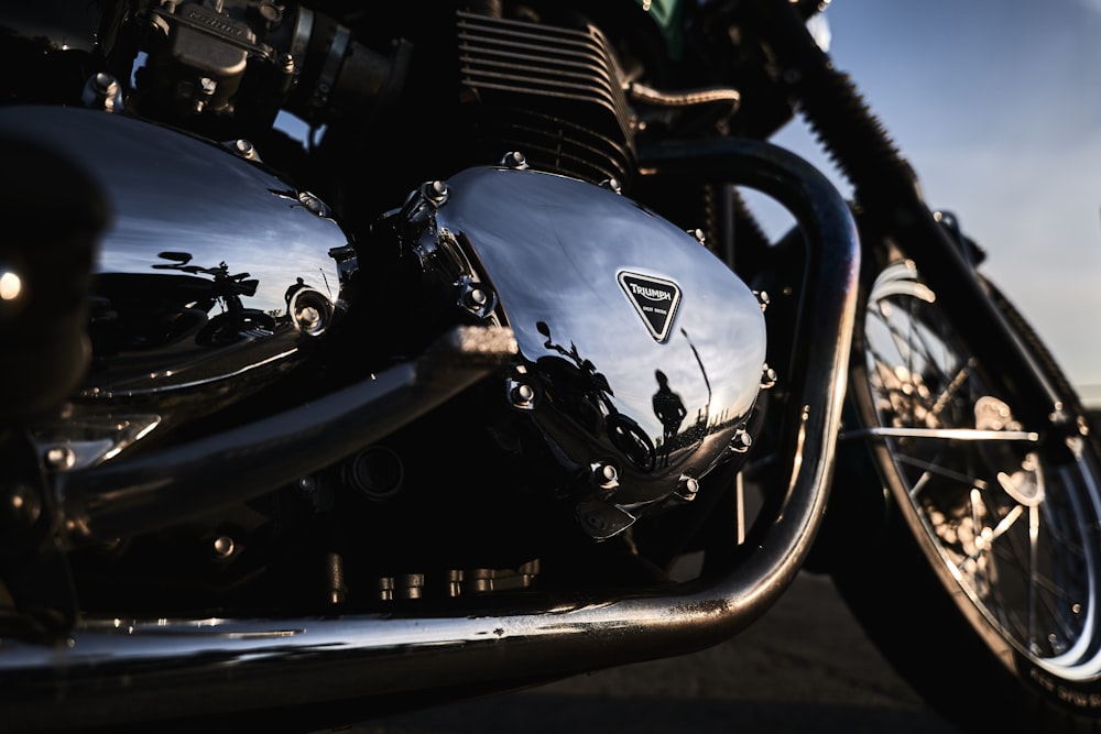 a close up of a motorcycle with a sky background
