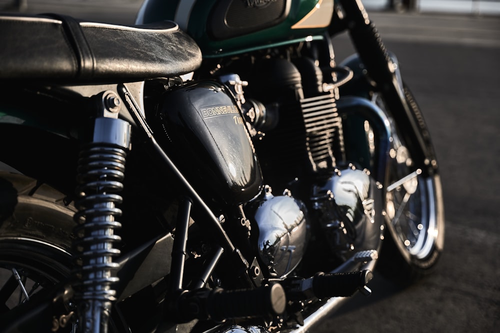 a close up of a motorcycle parked on the street