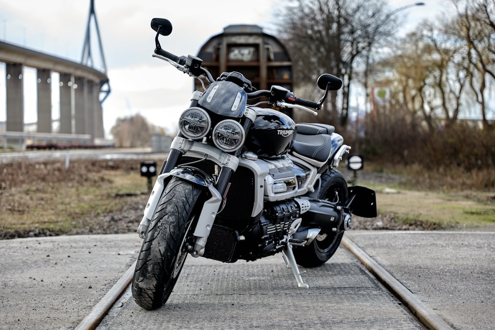 black and silver cruiser motorcycle on road during daytime