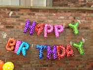 purple happy birthday wall decor
