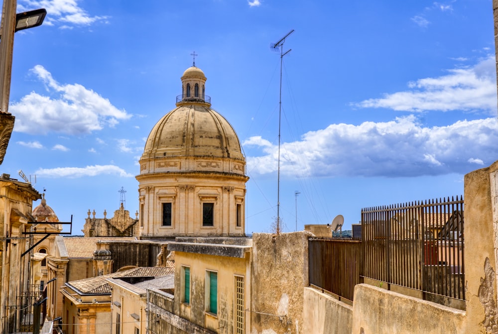 white dome building under blue sky during daytime