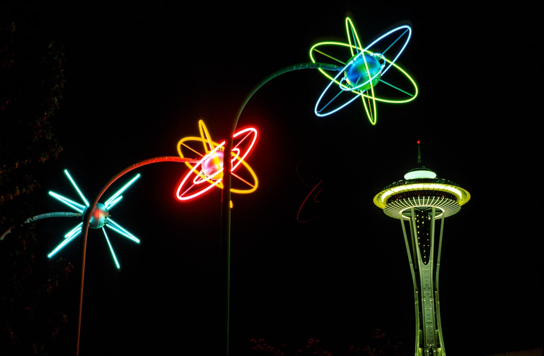 blue and red ferris wheel with lights