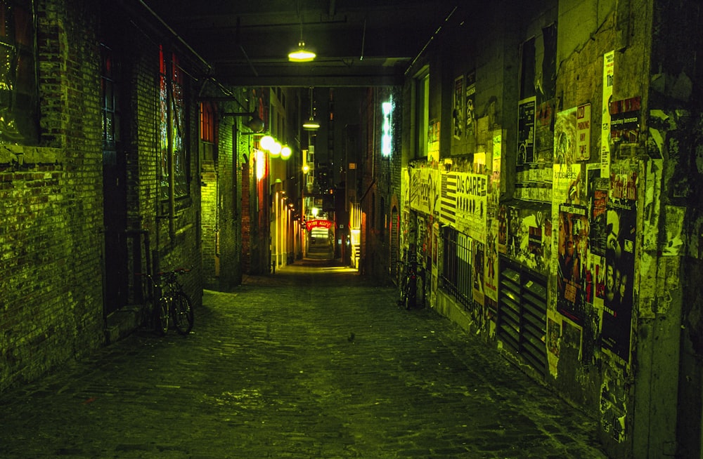 empty street with lighted lamps during nighttime