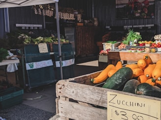 green and yellow vegetable on brown wooden crate