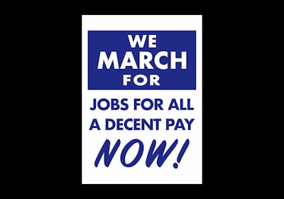 A poster with bold white and blue text stating 'We March for Jobs for All A Decent Pay Now!' against a solid blue and white background. The text is centered and emphasizes urgency and a call for action.
