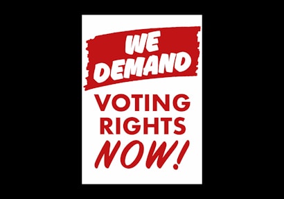 The image contains bold red and white text with a strong graphic design. It features the phrases 'We Demand' at the top and 'Voting Rights Now!' below in all capital letters.