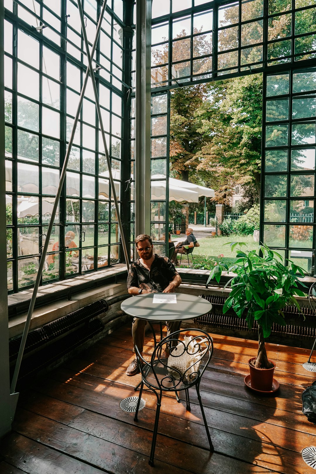 woman in black jacket sitting on chair