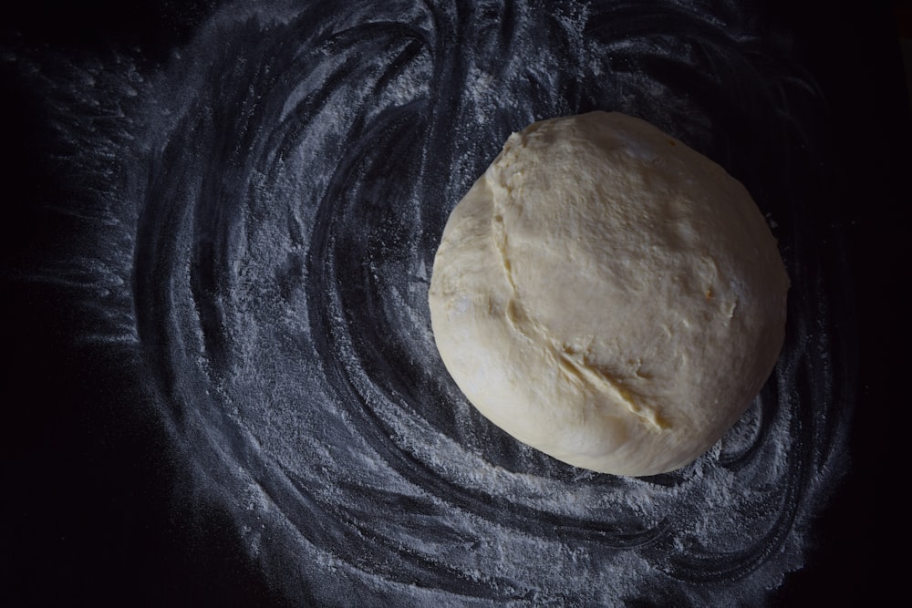 white dough on black textile