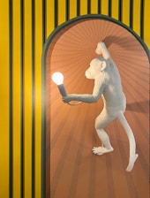 nude woman sitting on brown wicker chair
