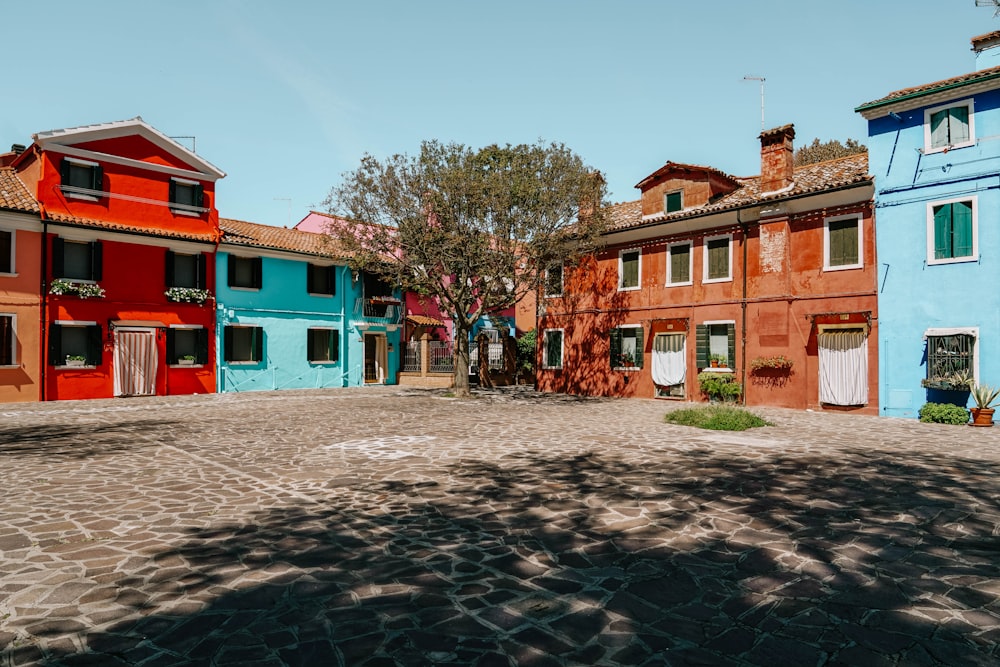 red and white concrete building under blue sky during daytime