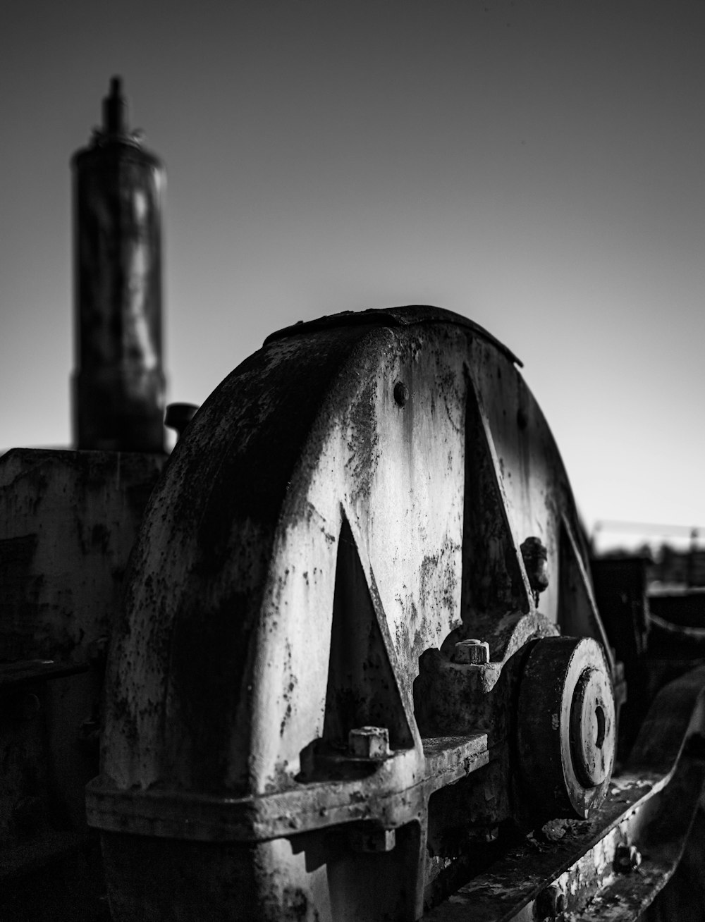 grayscale photo of car wheel