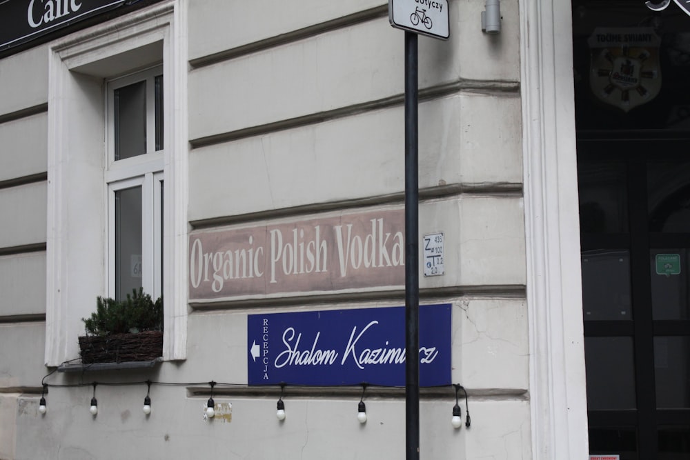 a building with a sign that says organic polish vodka