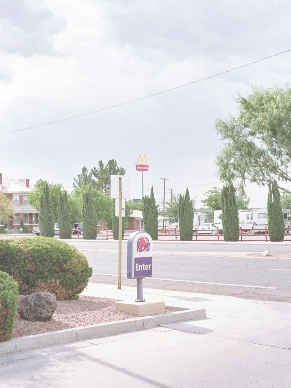 stop sign on gray concrete road